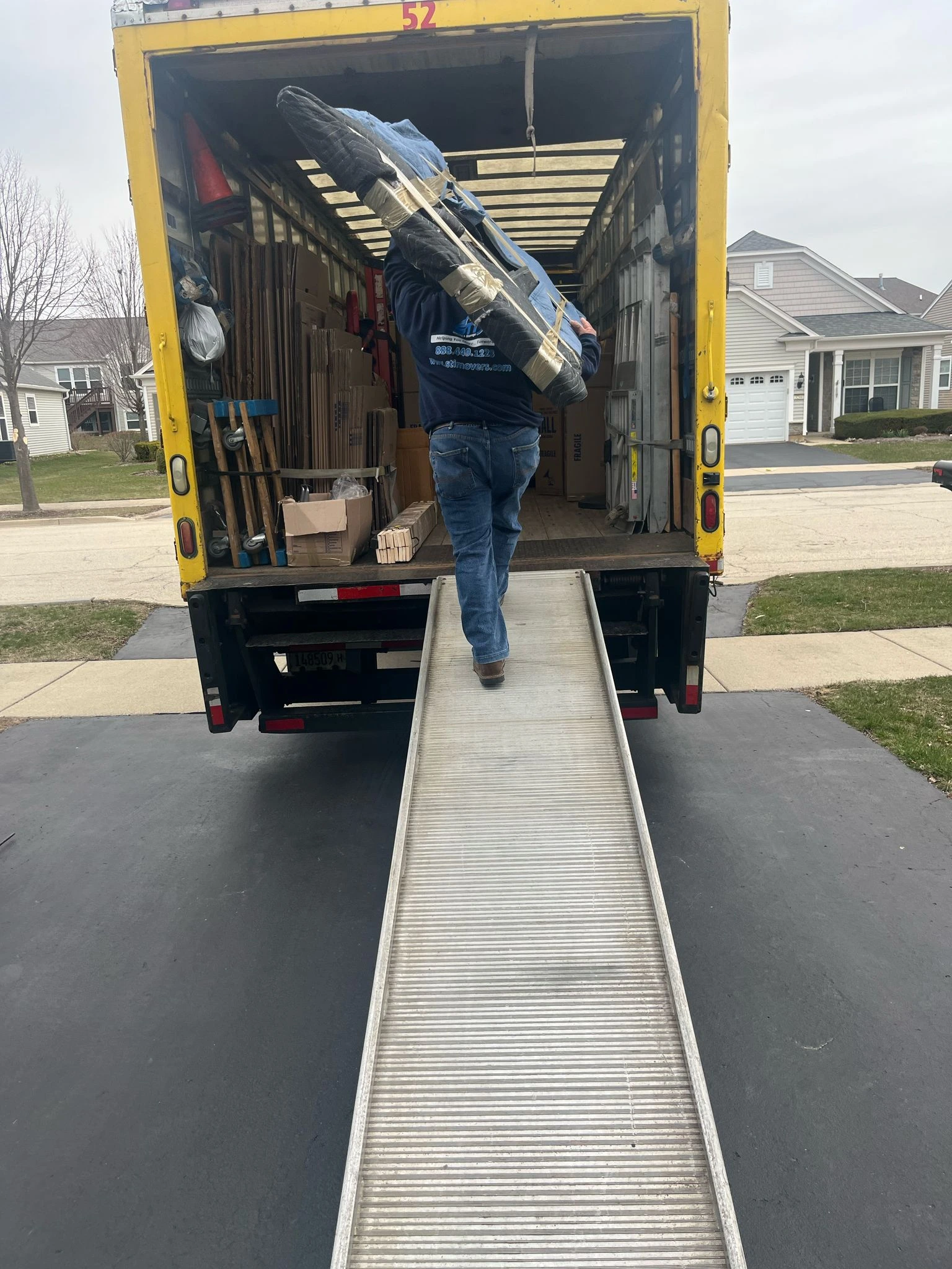 Movers loading truck near Oak Lawn