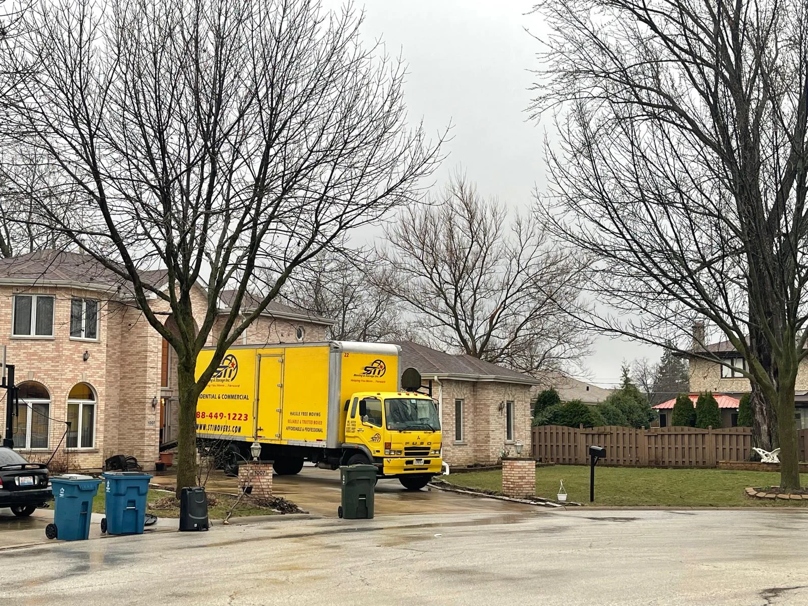 Fox Lake movers loading a moving truck near Pistakee Lake